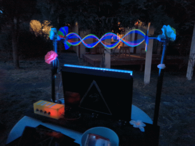 String Thing creating hovering multicolored waveforms